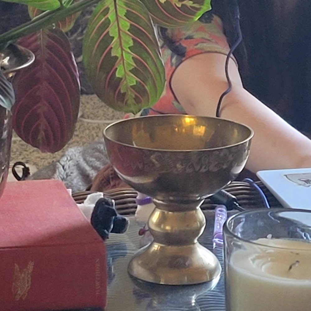 Vintage brass pedestal bowl with etched design